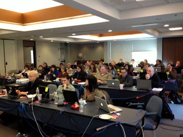 Green stickies in a packed class during one of the R lessons.